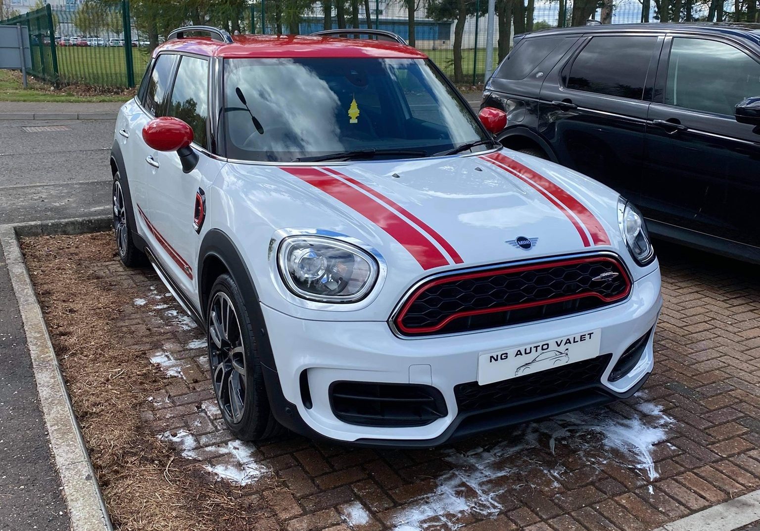 White Mini with red stripes after a full valet